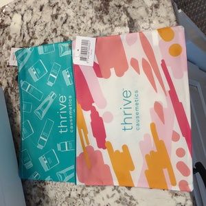 2 thrive cosmetics bags nwt